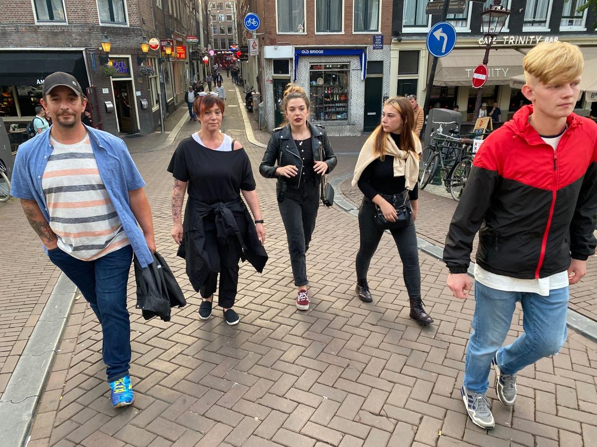 Guests walking together through central Amsterdam